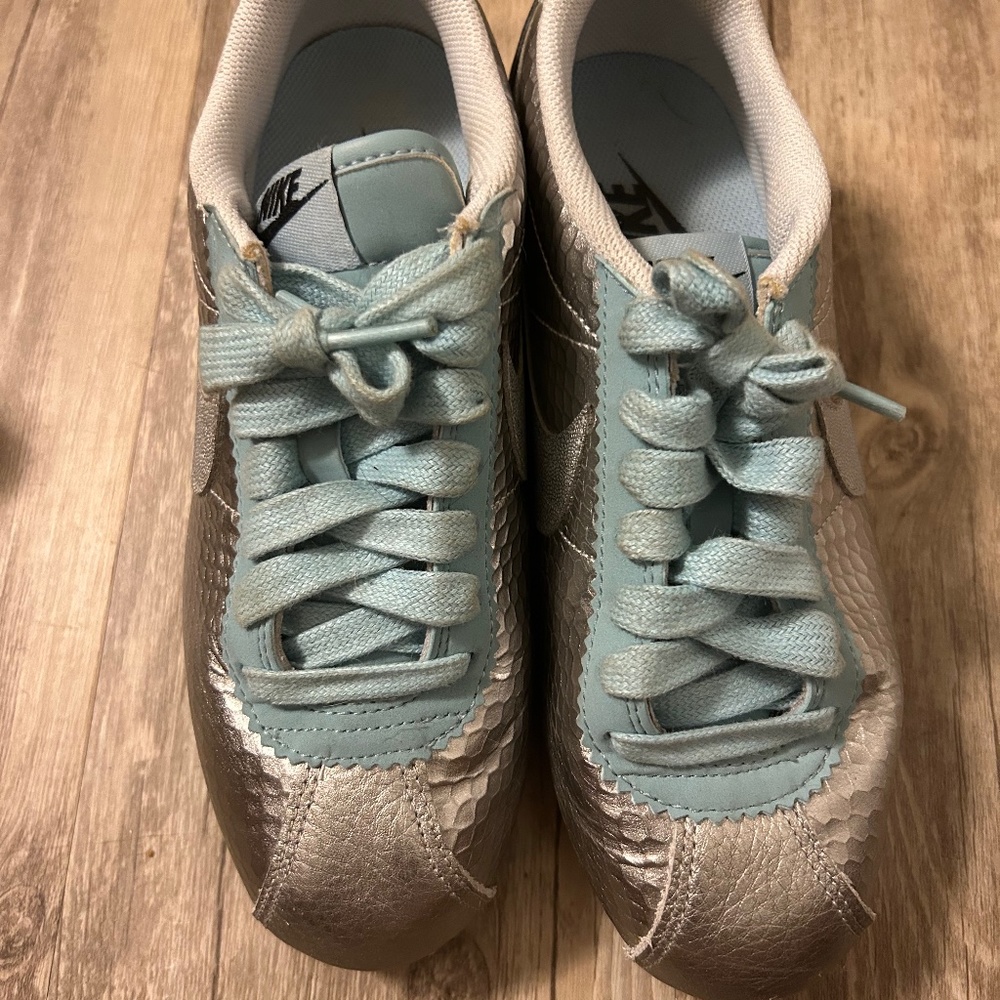 6.5 Women’s Silver and Blue Nike’s